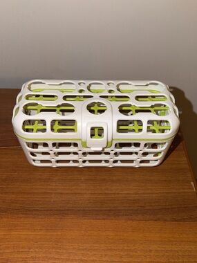 Munchkin green and white dishwasher basket for bottle nipples/pacifiers